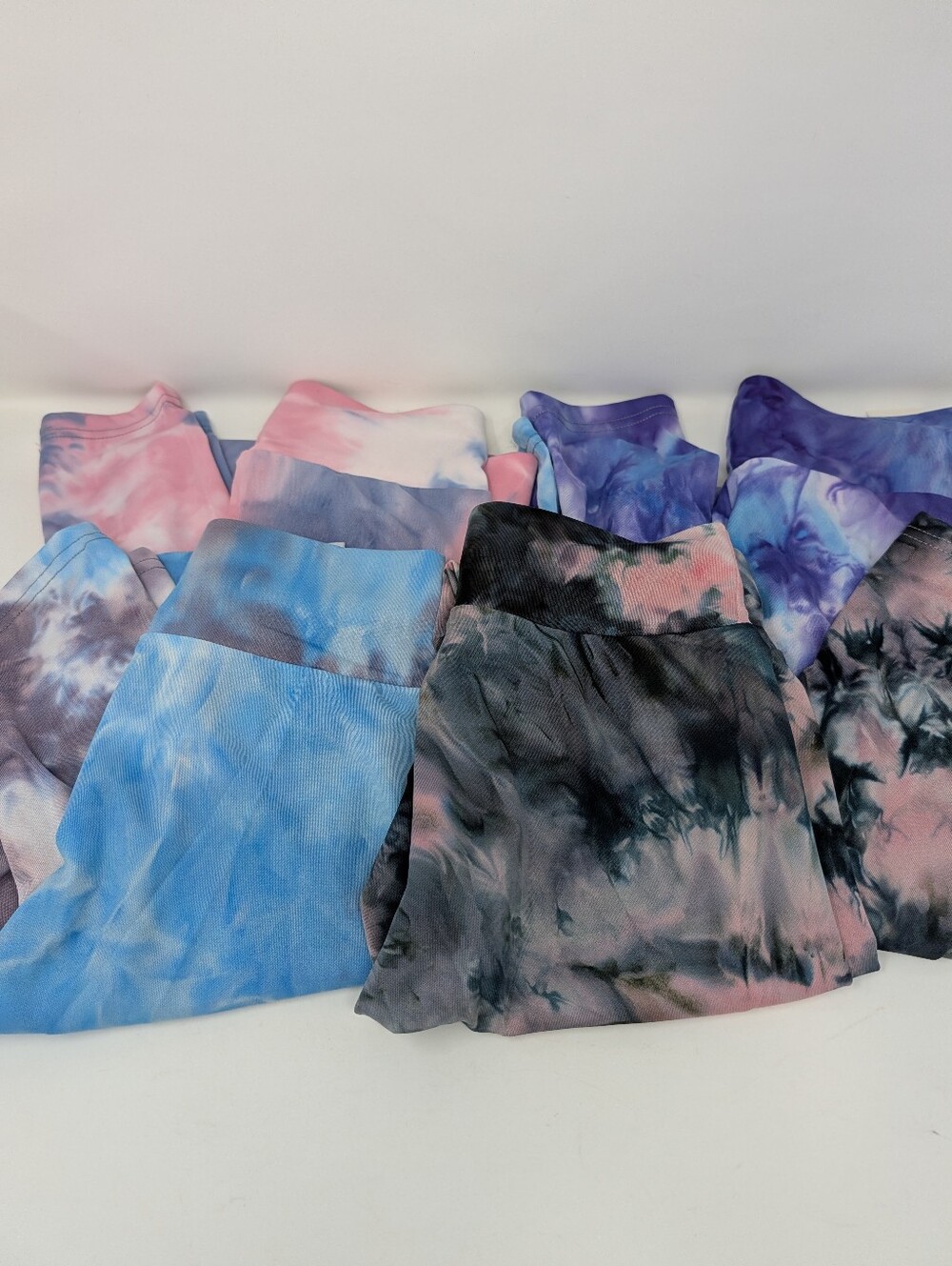 NWT. Set of 4 Women's Tie Dye Leggings - Size L/XL - Multicolor Stretch.